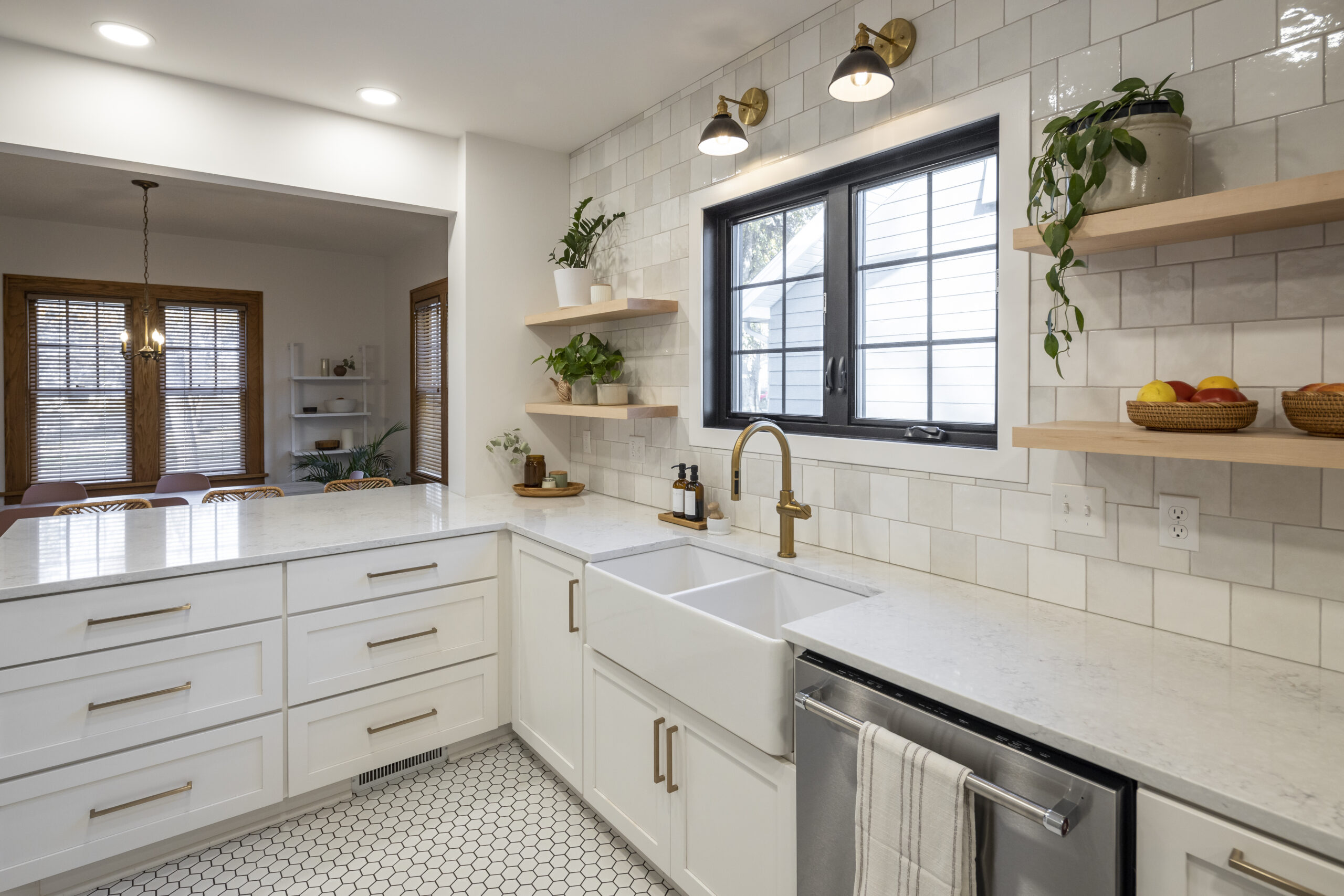 Image of items in a kitchen remodel, including counters, plumbing, cabinets, and lighting