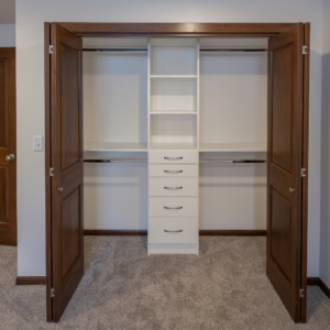 Deluxe rods and shelves in a custom closet.