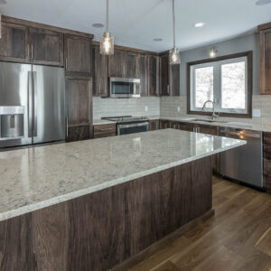 Remodeled kitchen with custom cabinets and island