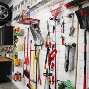 Wall hooks for organizing tools, landscaping equipment in a garage